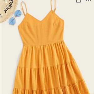 Yellow spaghetti strap ruffle dress